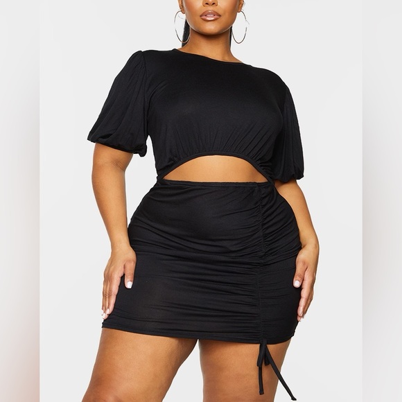 PrettyLittleThing Dresses & Skirts - 4/$22 NWT PrettyLittleThing black puff sleeve front cut out ruched mini dress